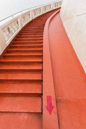 Winding red stairs at Golden Mountain Buddhist Temple, Bangkok, Thailand.の写真素材