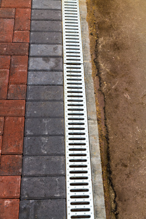 Drainage Channel with grid to drainage of driveway areaの写真素材