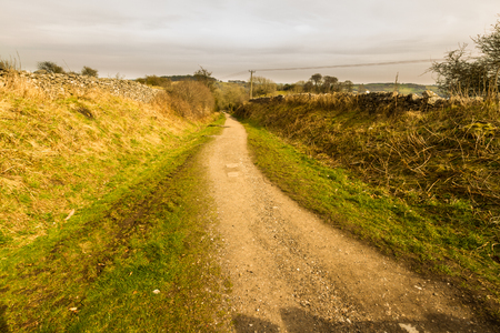 Looking down the old Middleton Top railway incline, now used as the High Peak walking and cycling trail. Cromford, Derbyshire, England, UK.の写真素材