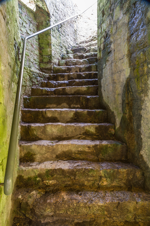 Stone staircase leading upwards in castleの写真素材