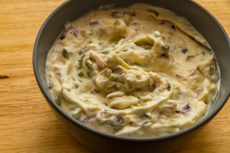 Home made tartar sauce in grey bowl.の写真素材
