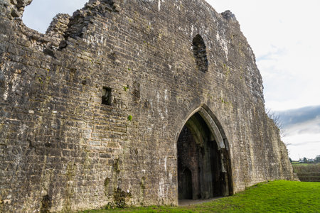 Wall of large courtyard castle St Quentins Castle, Llanblethian, South Wales.のeditorial素材