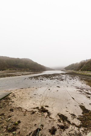 Solva, looking to see at dusk with light mist. St Brides Bay, Pembrokeshire, Wales, UKの写真素材