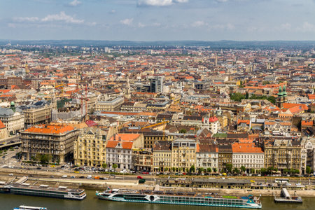 Budapest, Hungary â April 24 Elevated view of rooftops and River Danube with boats on April 24 2018 in Budapest.のeditorial素材