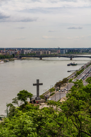 Budapest, Hungary â April 24 Stone cross on Gellert Hill with the River Danube on April 24 2018 in Budapest.のeditorial素材