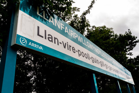 Llanfair , Wales â€“ August 27 Arriva Trains Station Platform sign for...
