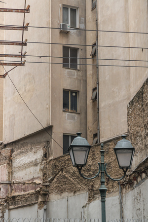 Old Street Lamps and concrete flats behind as copyspace.の写真素材