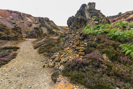 Different coloured rocks in ex copper mine area. Parys Mountain, Amlwch, Anglesey, Wales, United Kingdom.の写真素材