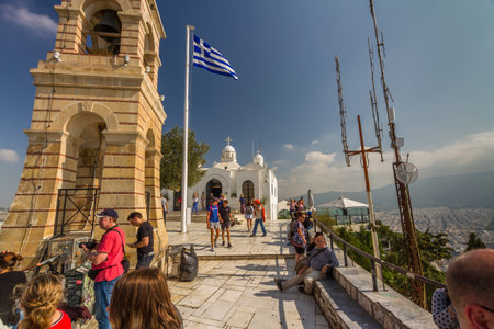 Athens, Greece â October Mount Lycabettus Viewing Area and Church of St George with tourists on October 24 2018 in Greece.のeditorial素材