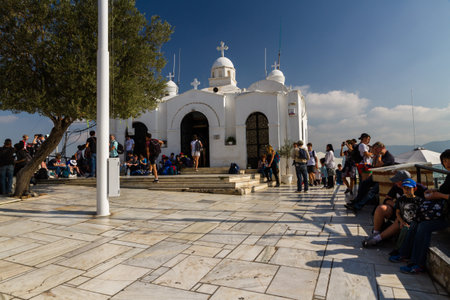 Athens, Greece â October Mount Lycabettus Viewing Area and Church of St George with tourists on October 24 2018 in Greece.のeditorial素材