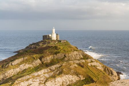 Wide angle view of the Mumbles and the lighthouse from clifftop, Swansea Wales.の写真素材