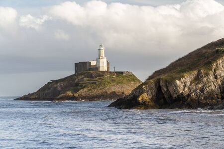 Wide angle view of the Mumbles and the lighthouse, Swansea Wales.の写真素材
