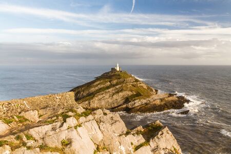 Wide angle view of the Mumbles and the lighthouse from clifftop, Swansea Wales, wide angleの写真素材
