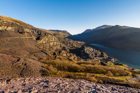 Dinorwic Slate quarry, upper part with Lake and Mountains and lake Peris. Llanberis, North Wales.の写真素材