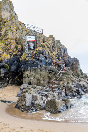Tenby, Wales â Steps up to the closed St Catherine's Island, on February 18 2019 in Walesのeditorial素材