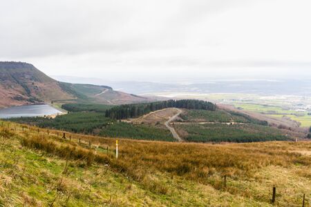 The Vale of Neath, with Llyn Fawr reservoir and dam, from Hirwuan Common.  South Wales, United Kingdom, Landscapeの写真素材