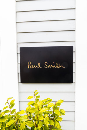 Bicester Village outlet, England , Sign or logo of Paul Smith on April  04 2019 in UK.のeditorial素材