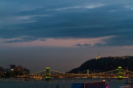 Evening view of River Danube at Budapest, Hungary, Chain Bridge and Statue of Liberty, wide angle.の写真素材