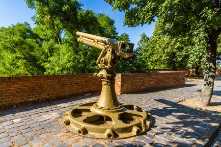 Old metal large gun painted brown.の写真素材