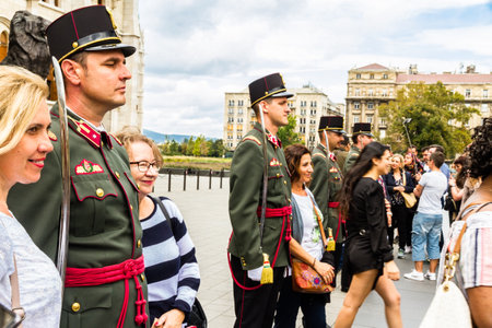 Budapest, Changing of the guard at the Hungarian Parliament Building, soldiers being photographed by tourists taking selfies landscape, on September 17 2019 in Hungaryのeditorial素材