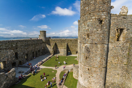 Harlech Wales â Interior of Harlech Castle with tourists, landscape, from above on September  27 2019 in United Kingdomのeditorial素材