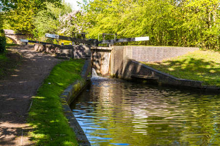 Gates of canal lock at Lapworth near Birmingham, on the Stratford-upon-Avon Canal, landscapeの写真素材