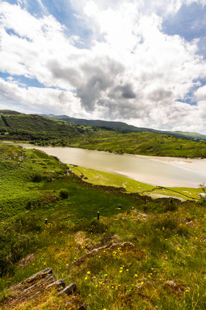 The tidal afon or river Drywyd. Penrhyndeudraeth, Eryri or Snowdonia national Park, Wales, landscape, wide angle, looking south east, portrait.の写真素材
