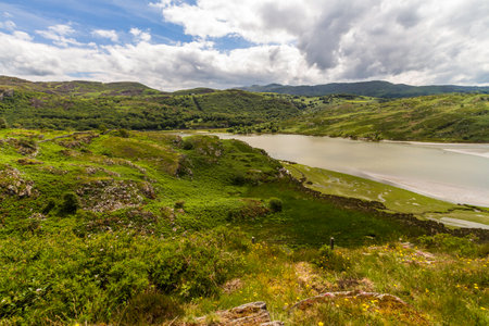 The tidal afon or river Drywyd. Penrhyndeudraeth, Eryri or Snowdonia national Park, Wales, landscape, wide angle, looking south east.の写真素材