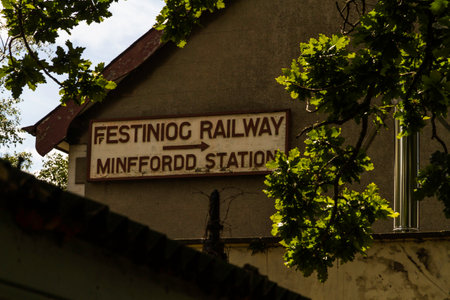 Sign for Minfford Railway Station on station wall on the Ffestiniog Railway. Penrhyndeudraeth, Eryri or Snowdonia national Park, Wales, landscapeの写真素材