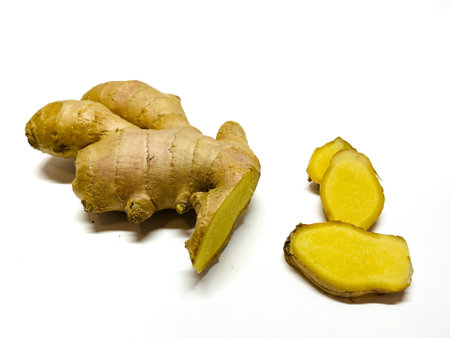 Ginger root and slices isolated on white background, healthy food.の写真素材