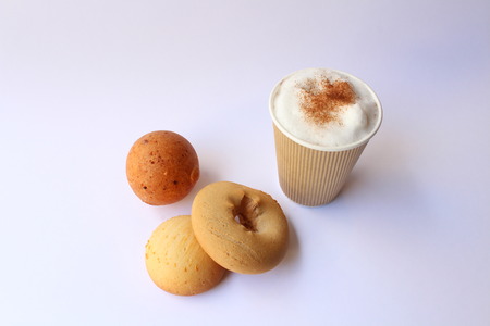 Take away capuccino coffee with some traditional colombian pastries, usually served for breakfast. Almojabana, buÃ±uelo and pandebono.の写真素材