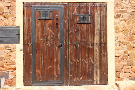 Traditional big old door to a house.の写真素材