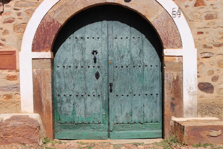 Traditional big old door to a house.の写真素材