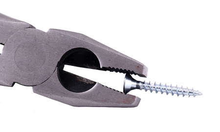 Pliers handling a screw on white backgroundの写真素材
