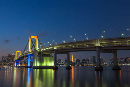 Rainbow Bridge with light at nightの写真素材