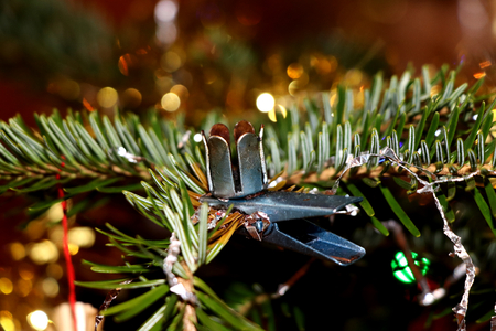 The Metal handle for candle on a christmas treeの写真素材