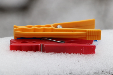 A three pegs create a small pyramid on some parapetの写真素材