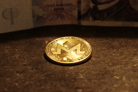 A gold monero, type of cryptocurrency. Digital money for investmentの写真素材