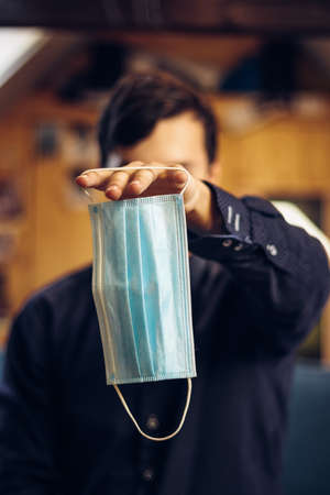 Face mask. Today's protective tool against the deadly virus - Covid19. Medical business. You can't go anywhere without a face maskの写真素材