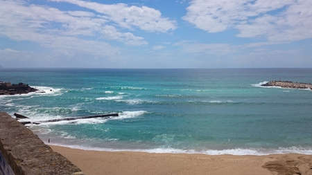 The beautiful beach of Ericeira in Portugalの写真素材