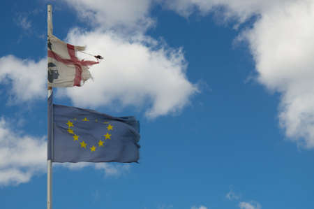 a couple of ruined flags of Sardinia and Europe