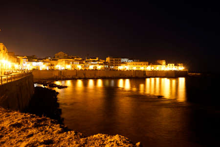 Ortygia Island's Coast by Night in Syracuseの写真素材