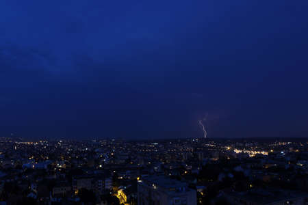 Multiple lightning strikes over a big city by night - in Belgrade, Serbia