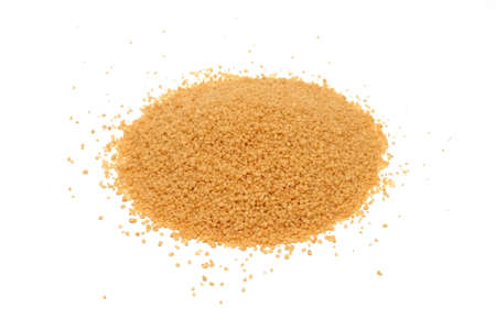 Cous Cous grains pile isolated on white backgroundの写真素材