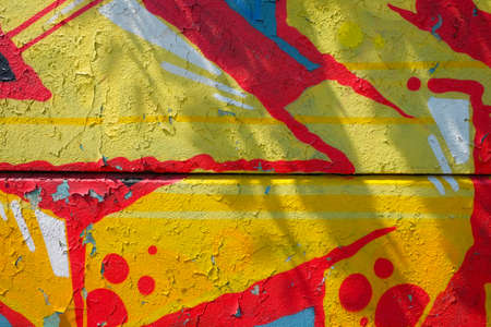 Graffiti on a wall - detail of a graffiti painted on a wallの写真素材