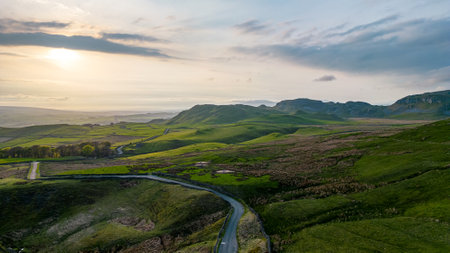 Aerial view of the road in the mountains at sunset, Spainの写真素材