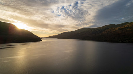 Aerial view of a beautiful lake at sunset in Scotland, UKの写真素材
