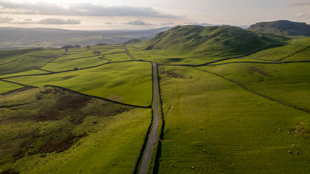 Aerial view of a rural road in the Yorkshire Dales.の写真素材