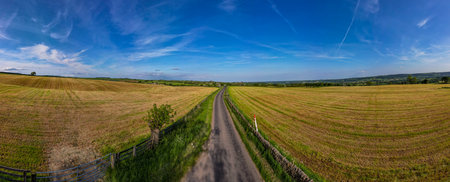Aerial panoramic view of a rural road in the countryside.の写真素材