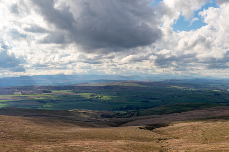 A view of the English Lake District under a cloudy sky in Autumnの写真素材